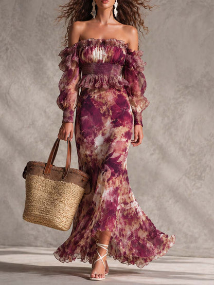 Valeria | Vestido largo de gasa rosa con estampado floral y hombros al descubierto