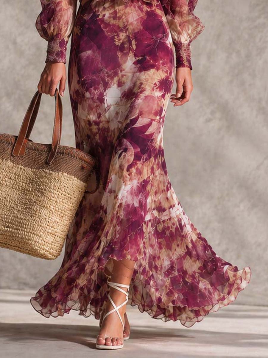 Valeria | Vestido largo de gasa rosa con estampado floral y hombros al descubierto