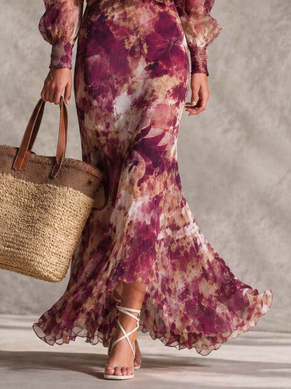 Valeria | Vestido largo de gasa rosa con estampado floral y hombros al descubierto